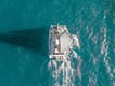 Explore BVI aboard Catamaran Rendezvous III | Yacht4Less