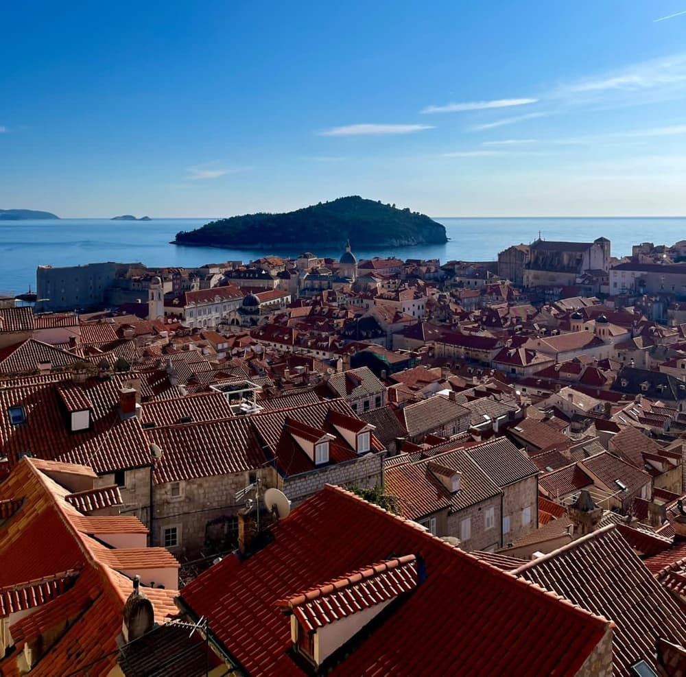 High angle view of Dubrovnik Old Town red rooftops and Lokrum Island in Croatia