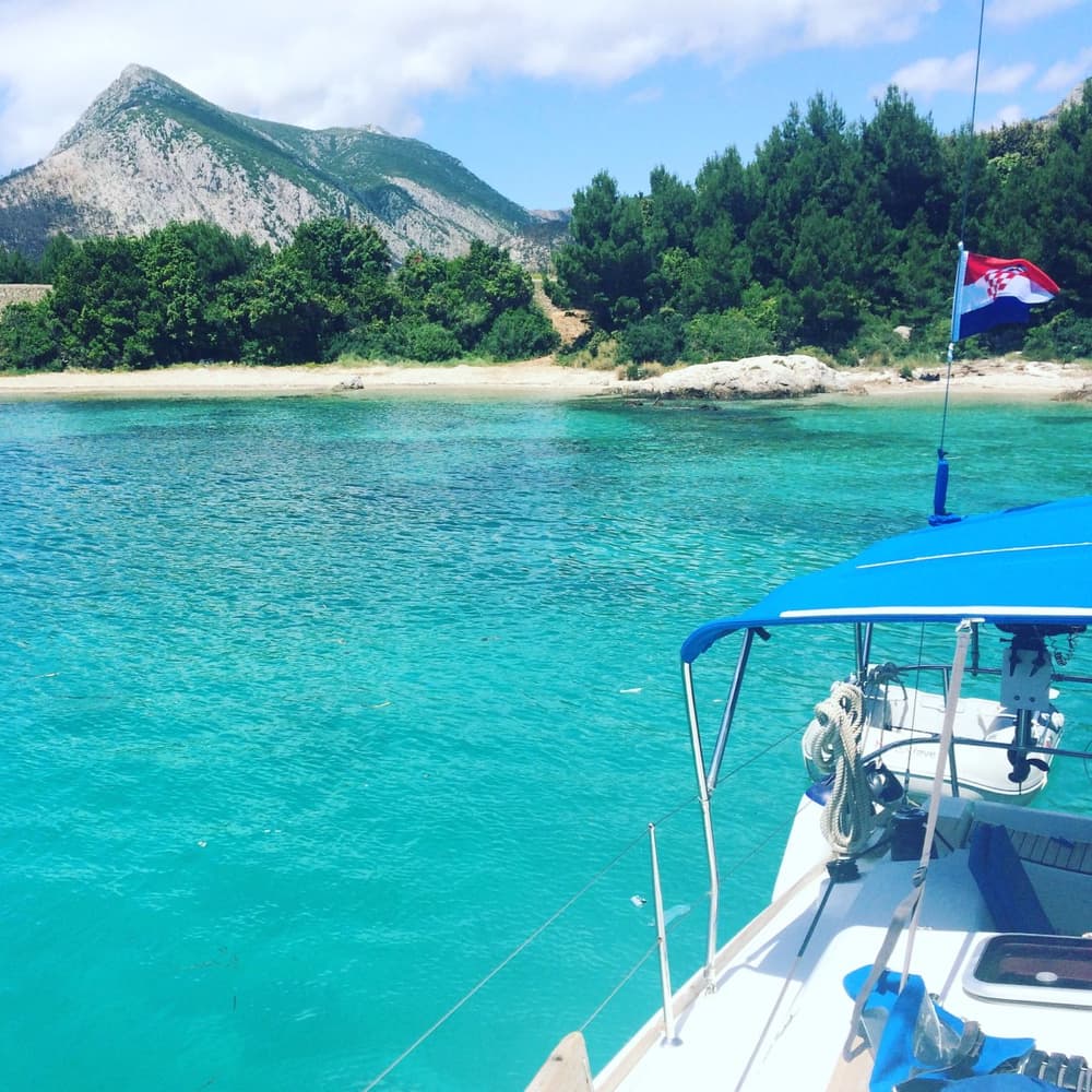 Sailboat Anchored in a Turquoise Bay, Croatia
