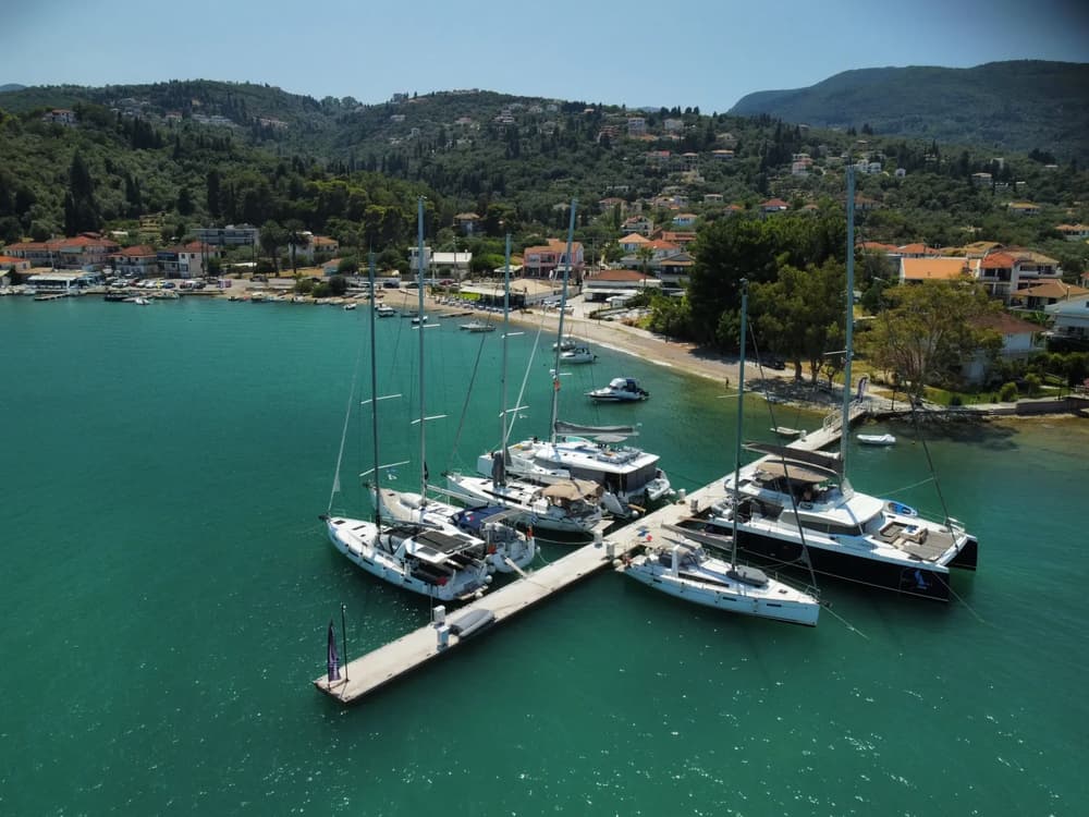 View of pontoon with sailing yachts and sailing catamarans in Lygia near Lefkas