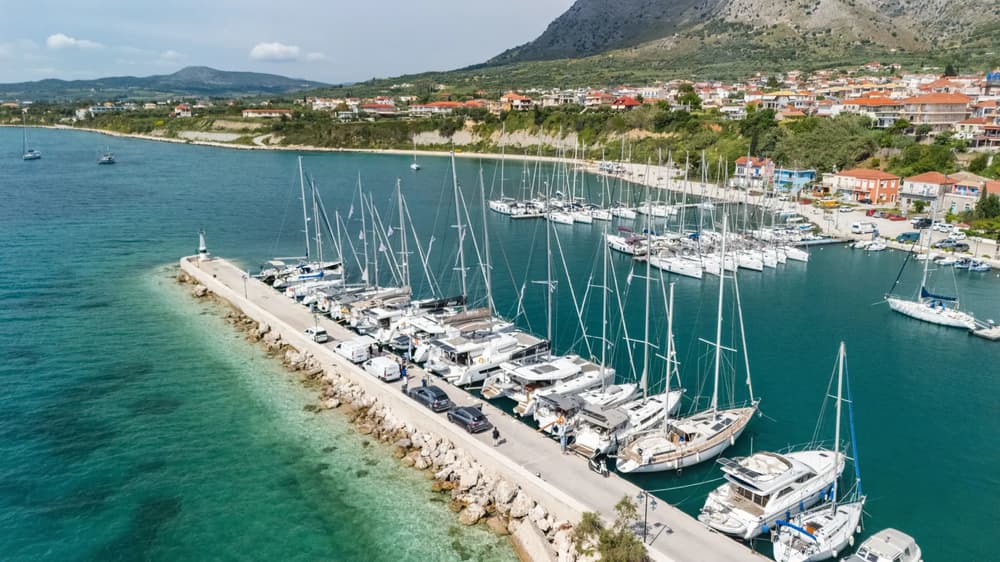 view of Palairos port with sailing yachts and sailing catamarans