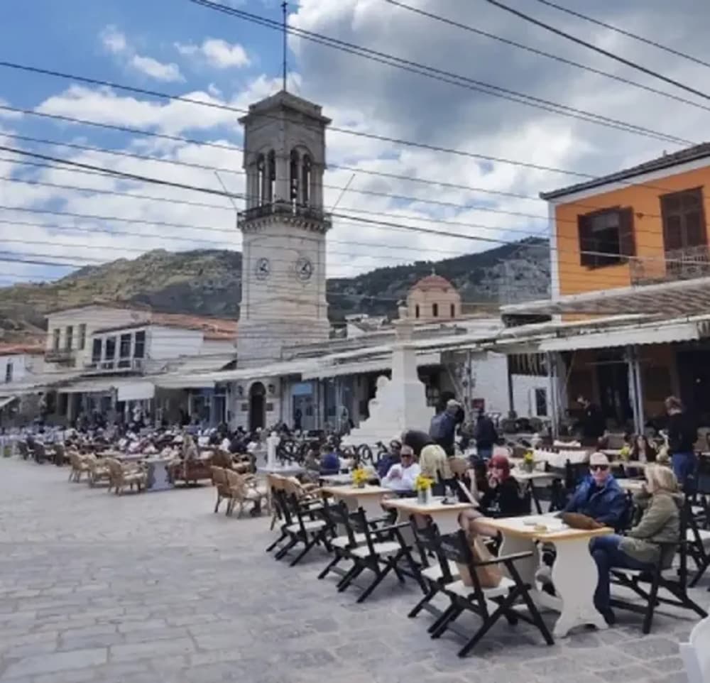 Vibrant town square on Hydra Island, a must-visit on a sailing trip with friends from Athens.