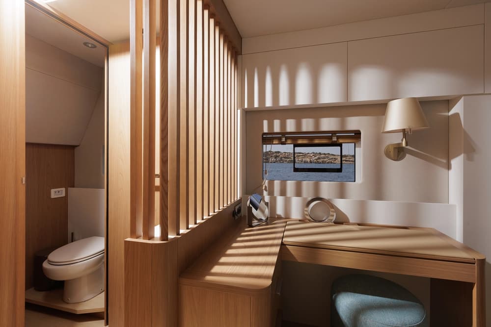 Modern ensuite bathroom and writing desk on Bali 5.8 catamaran cabin with sea view