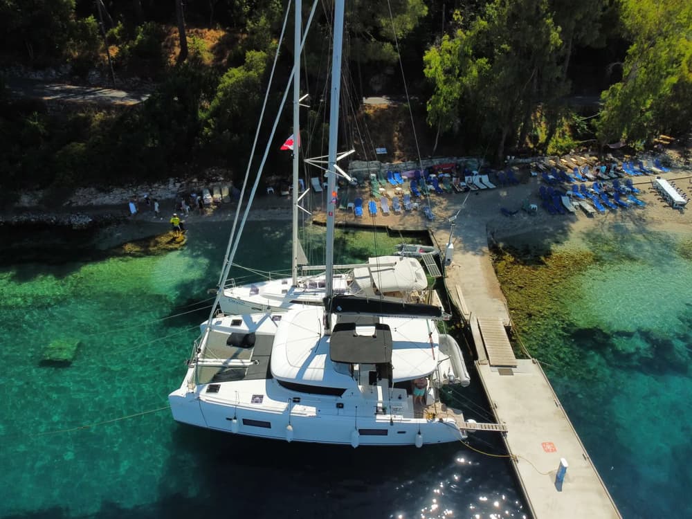 tandem charter sailing yacht + catamaran