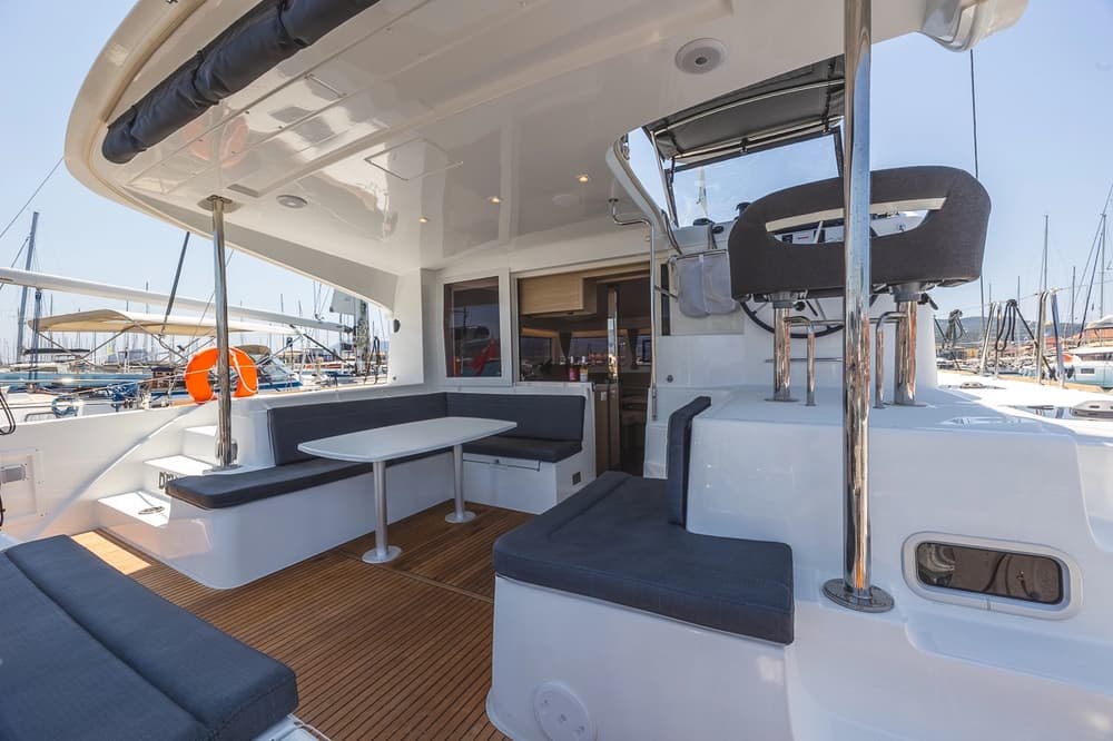 Cockpit of Lagoon 40 catamaran with shaded seating and helm position – part of Lagoon 40 review for yacht charter and sailing holiday planning.