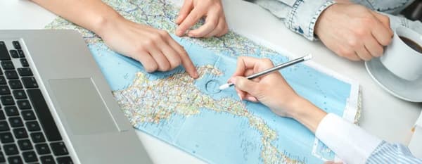 Planning a yacht charter route on a nautical map – choosing the best sailing destinations based on difficulty and experience level.