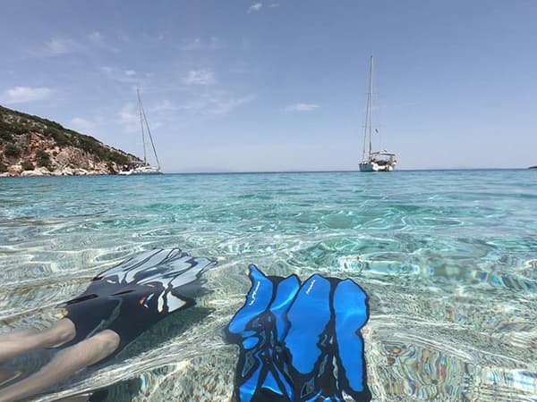 Snorkeling in the Ionian Sea during a sailing itinerary from Athens to Corfu.