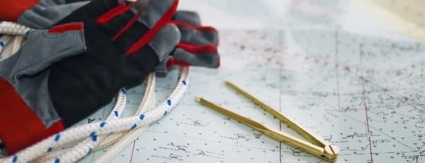 Sailing navigation tools on a nautical chart—learn essential sailing terminology for navigation, boat handling, and communication at sea.