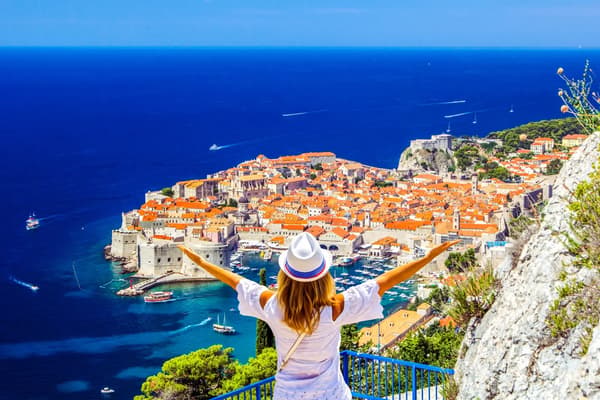 Panoramic scenic viewpoint of Dubrovnik Old Town walls and harbor in Croatia
